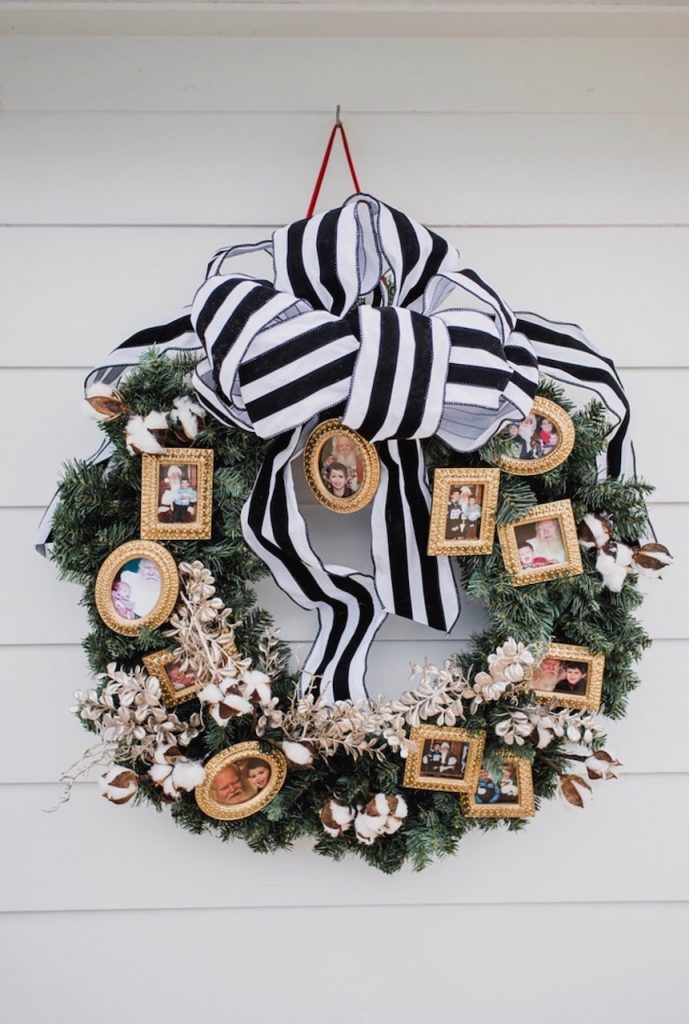 christmas wreath with framed photos