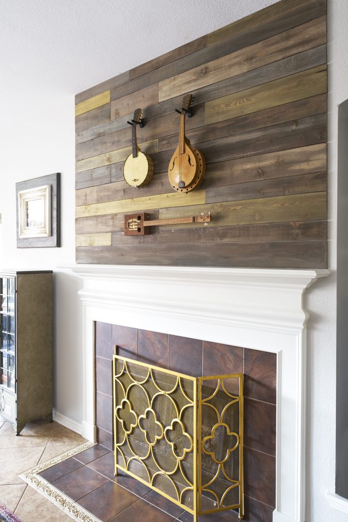 mantel with stringed instruments