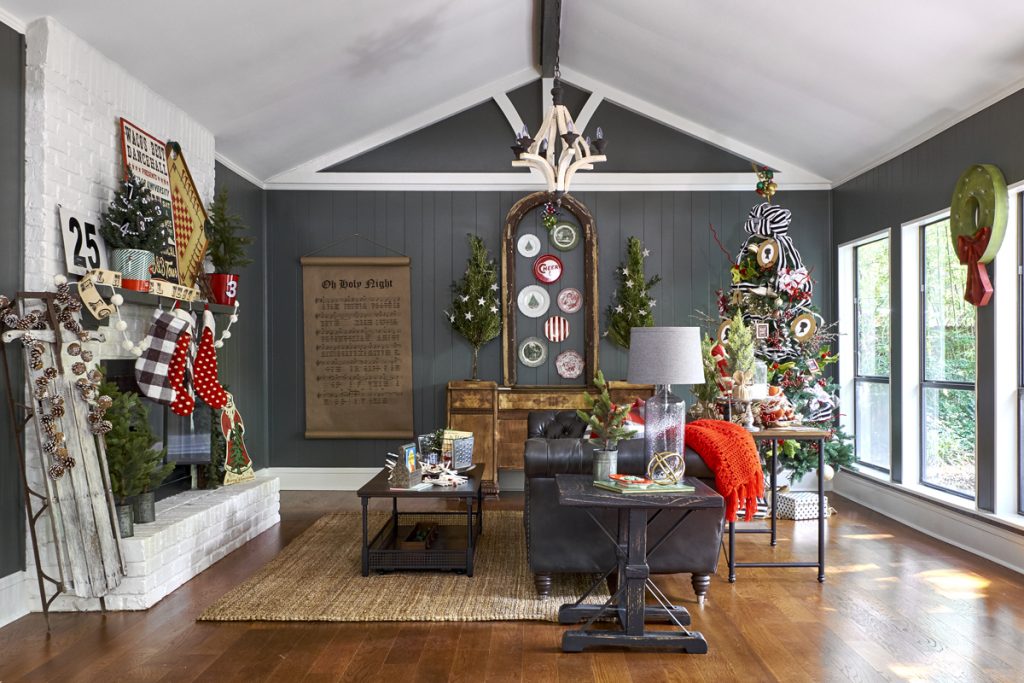 decorating with multiple Christmas trees