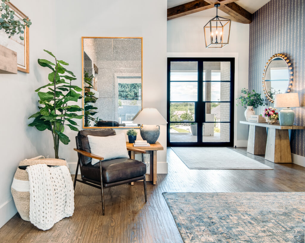 white-brick-fireplace-leather-chairs.jpg
